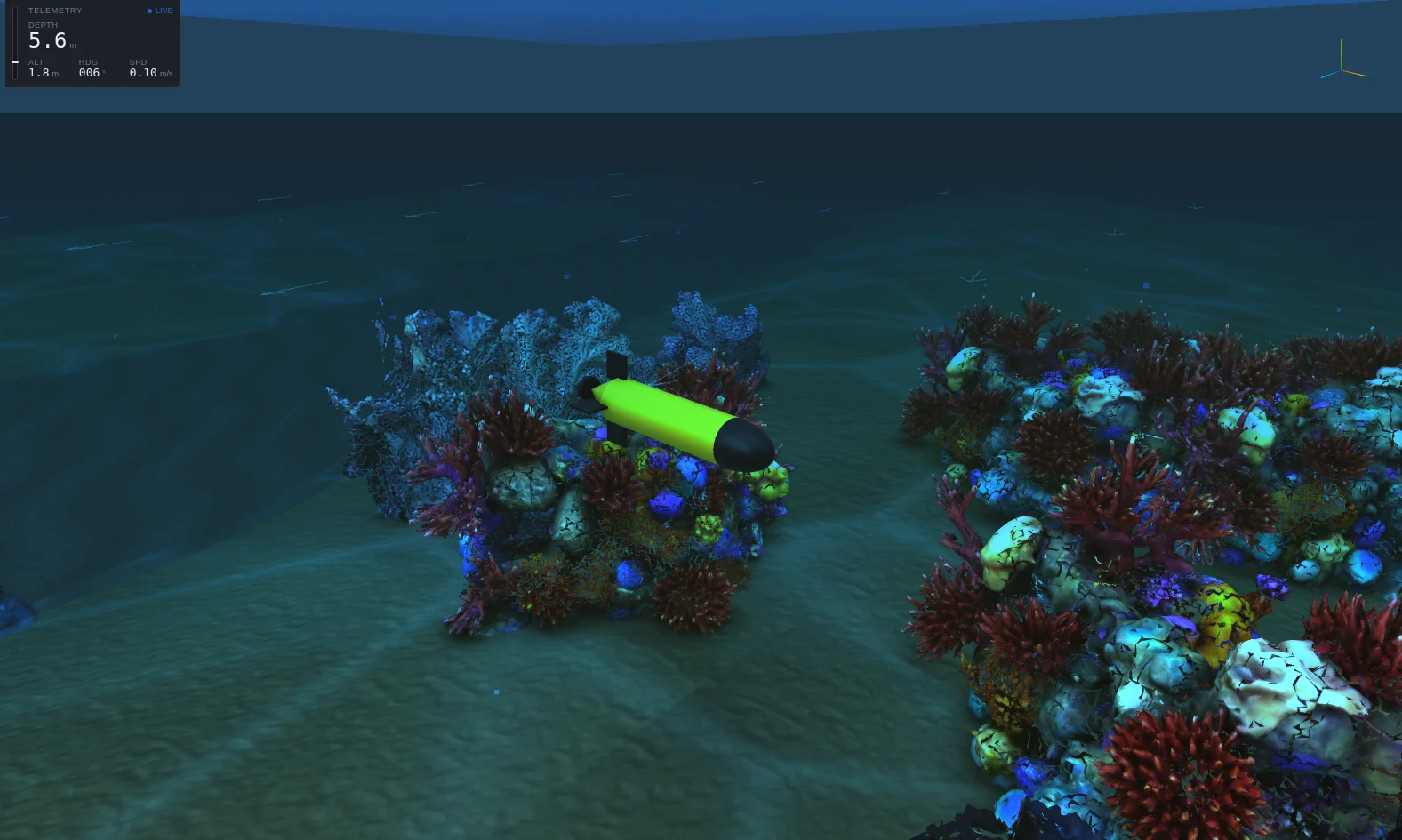 A REMUS-100-class AUV with a yellow-green hull passing between two scanned coral heads covered in sea fans and coloured coral.
